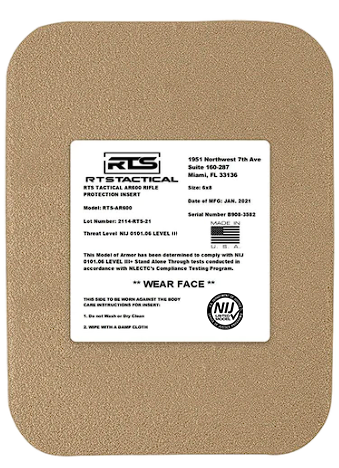 Tan ballistic armor plate with a white label. Text includes model, size, and compliance information.