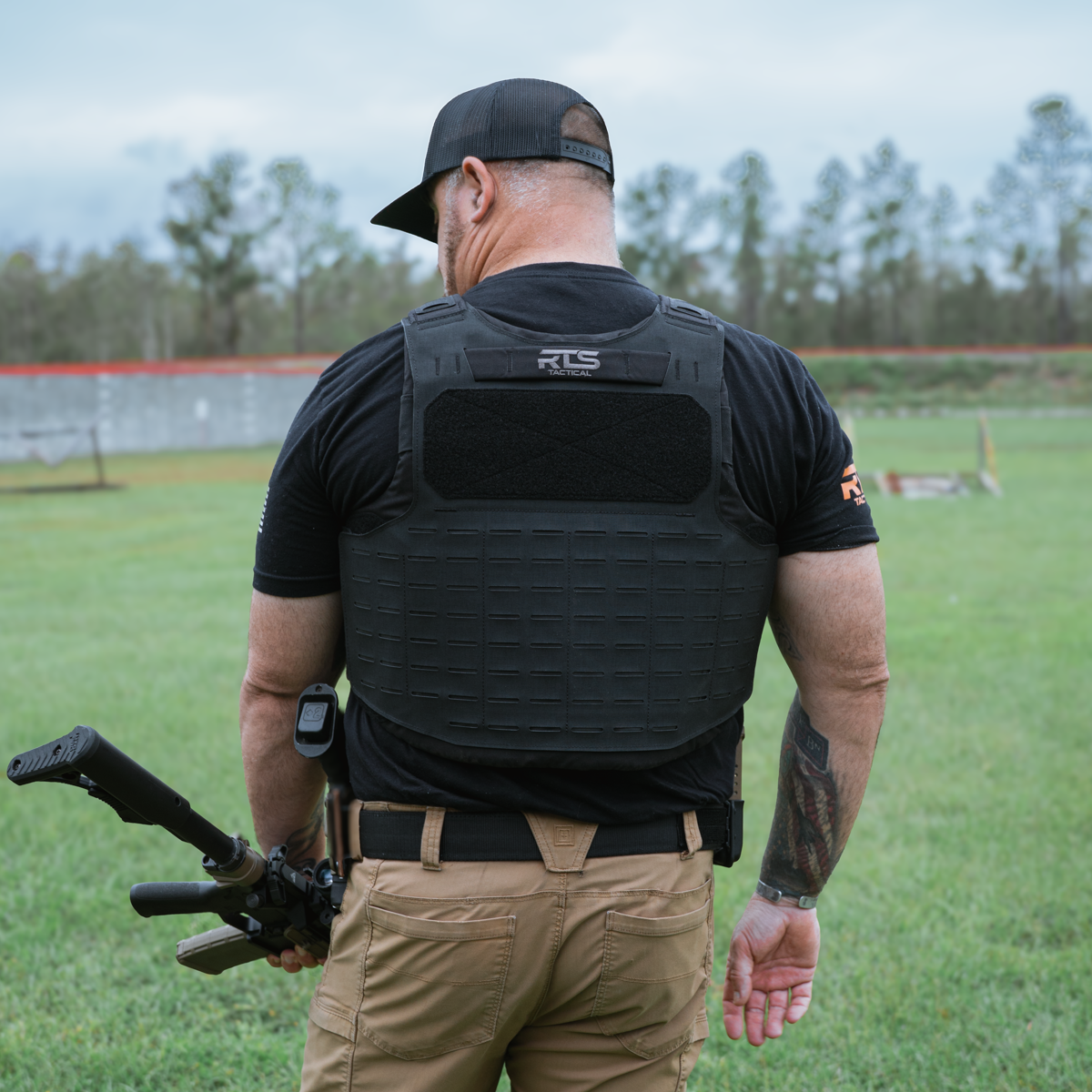 operator with slim tac vest on