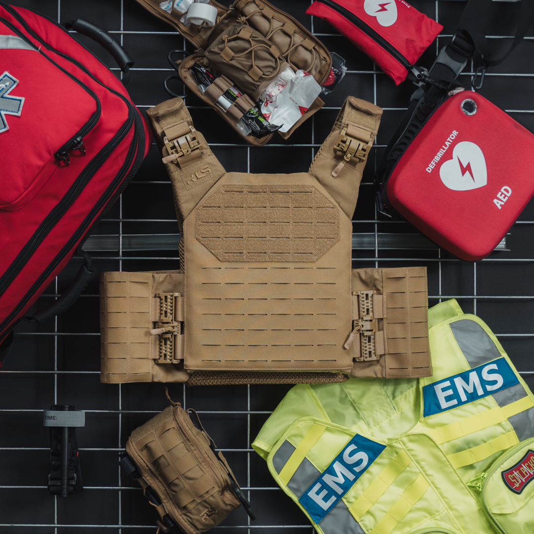 The Coyote HST Quick Release Plate Carrier with a premium laser-cut MOLLE cummerbund.