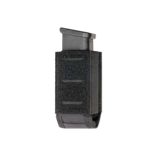 A tactical black nylon magazine holster with a Velcro strap, holding a single magazine.
