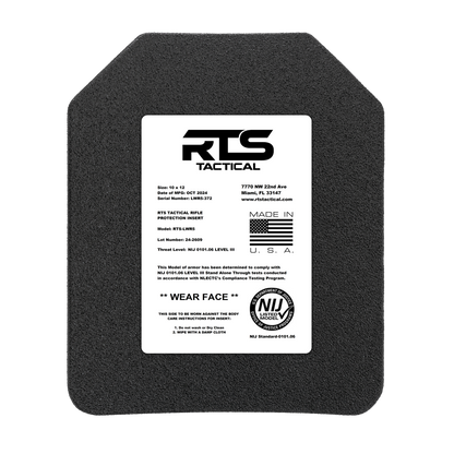 A black ballistic plate with a white label from RTS Tactical. The label details model, size, and compliance standards.