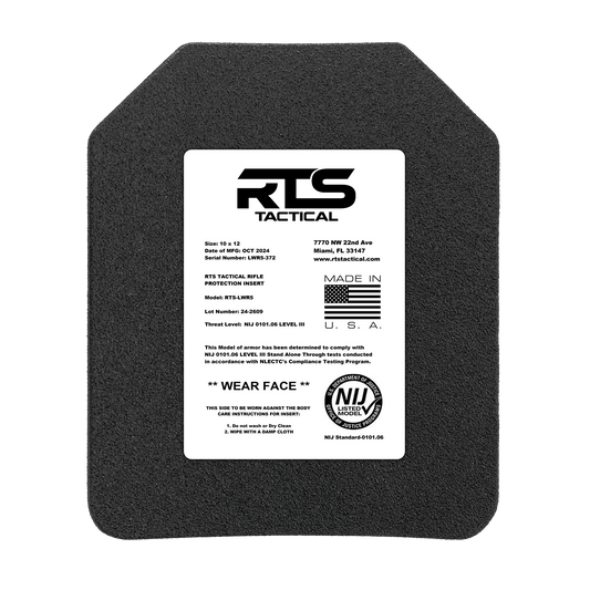 A black ballistic plate with a white label from RTS Tactical. The label details model, size, and compliance standards.