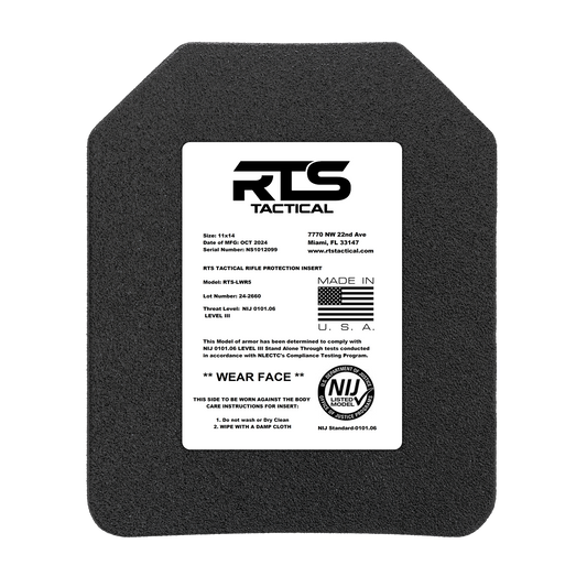 A black ballistic plate with a white label from RTS Tactical. The label details model, size, and compliance standards.