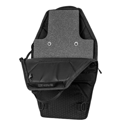 An open ballistic shield carrier with a shield inside
