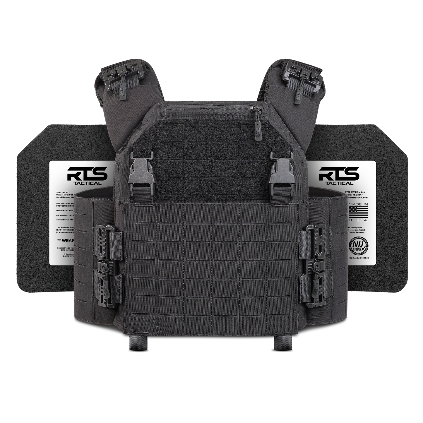 Black tactical vest with adjustable straps, buckle closures, and modular grid design. Two labeled ballistic plates visible in the background.