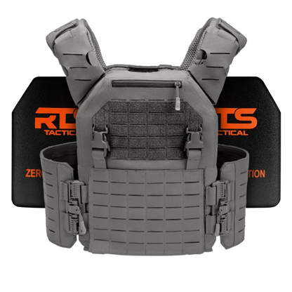 A gray tactical vest with secure straps and pouches is displayed in front of a black ballistic plate featuring bright orange text.
