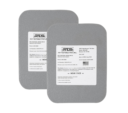 Two gray tactical rifle protection inserts with white labels showing the RTS Tactical logo and text about model and threat level.