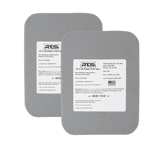 Two gray tactical rifle protection inserts with white labels showing the RTS Tactical logo and text about model and threat level.