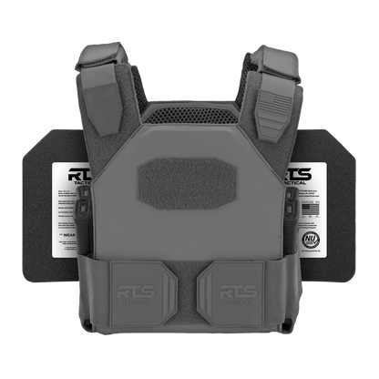 A gray tactical vest with padded shoulder straps and Velcro panels. It's designed for protection, displaying durability and functionality.