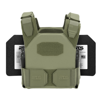 A green tactical vest with magazine pouches is displayed against a black background.