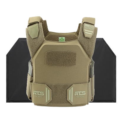 Tan tactical vest with padded shoulders and Velcro panels, displayed in front of black armor plates. The vest has a sturdy, protective appearance.
