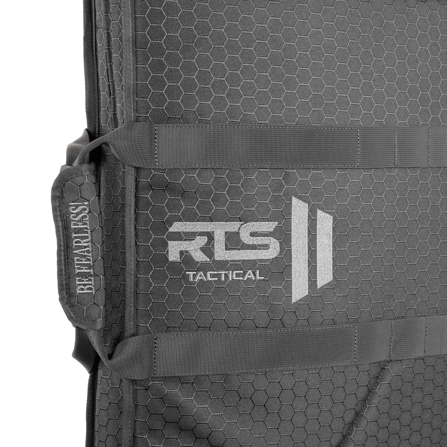 Gray tactical shield bag with hexagonal pattern. Features "RTS Tactical" logo, diagonal stripes, and "Be Fearless" text. Rugged, durable design.