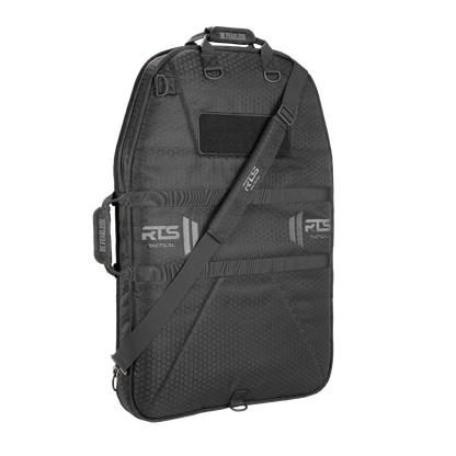 Black tactical shield bag with textured pattern, adjustable shoulder strap, and RTS branding. It has multiple compartments and a rugged design.