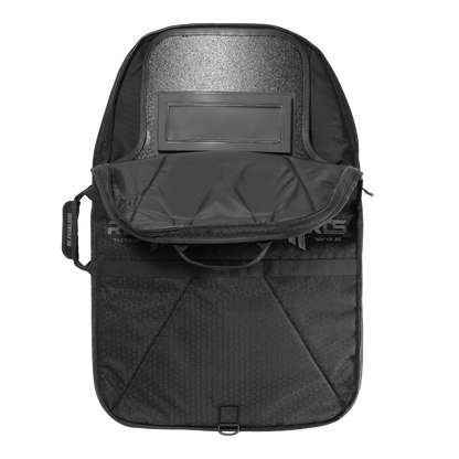 Open black tactical shield bag with hexagonal pattern, showing interior padding and rectangular compartment. The design suggests functionality and resilience.