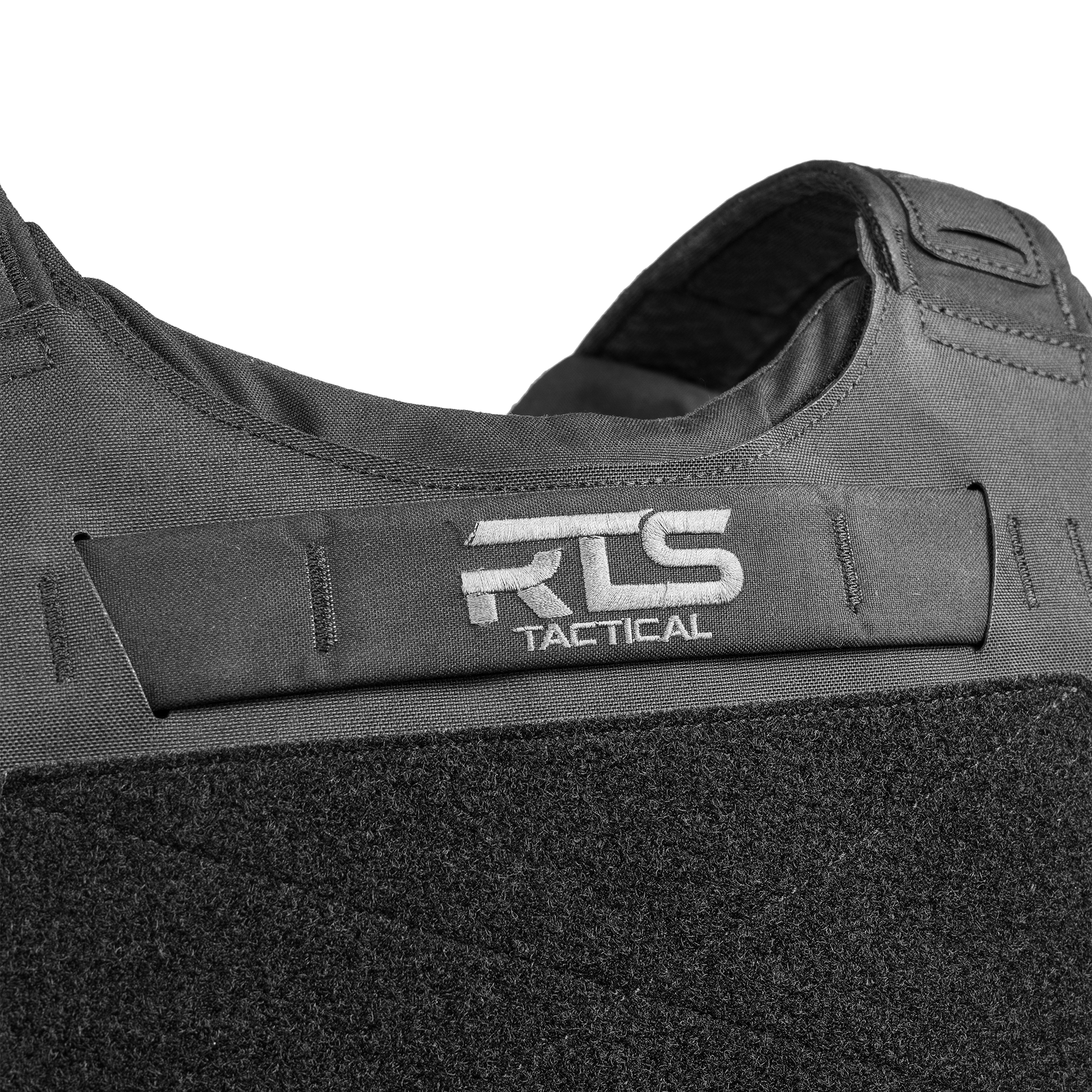 Close-up of a tactical vest featuring a black fabric design with RTS Tactical logo