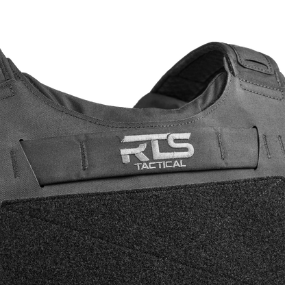 Close-up of a tactical vest featuring a black fabric design with RTS Tactical logo