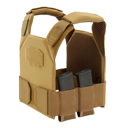 Tan tactical vest with sturdy straps and multiple compartments, holding two rifle magazines.
