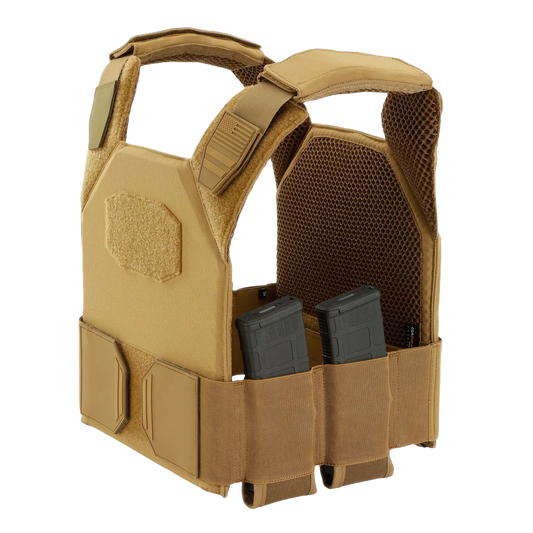 Tan tactical vest with sturdy straps and multiple compartments, holding two rifle magazines.