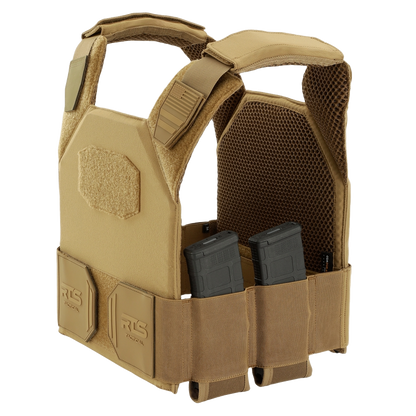 Tan tactical vest with sturdy straps and multiple compartments, holding two rifle magazines.