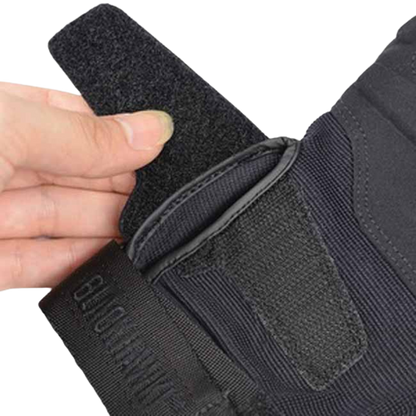 The Velcro wrist strap of the Blackhawk S.O.L.A.G. Special Ops 1/2 Finger Light Assault Gloves.
