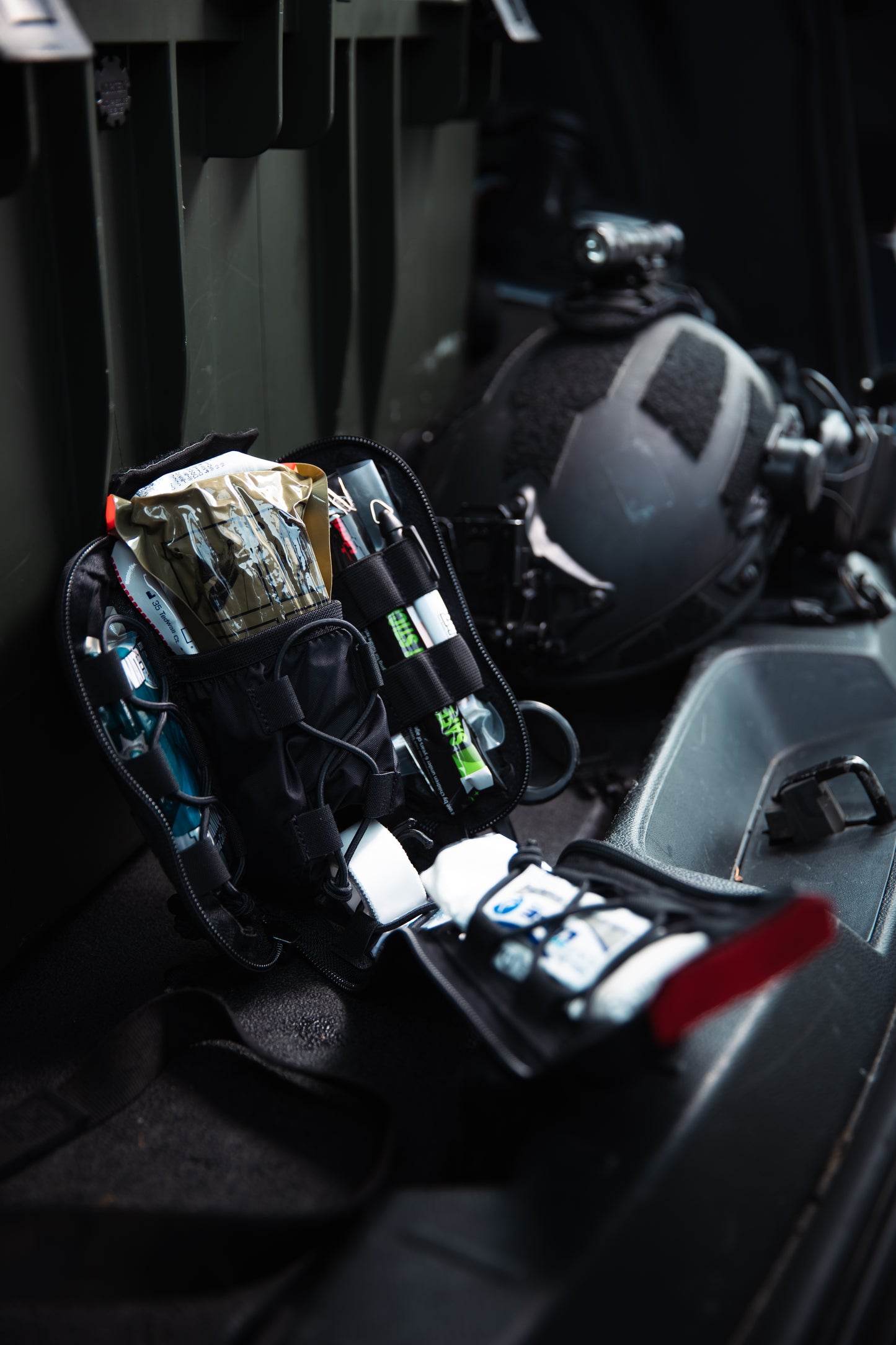 The RTS Tactical Black IFAK kit open and ready for use in high stress situations.