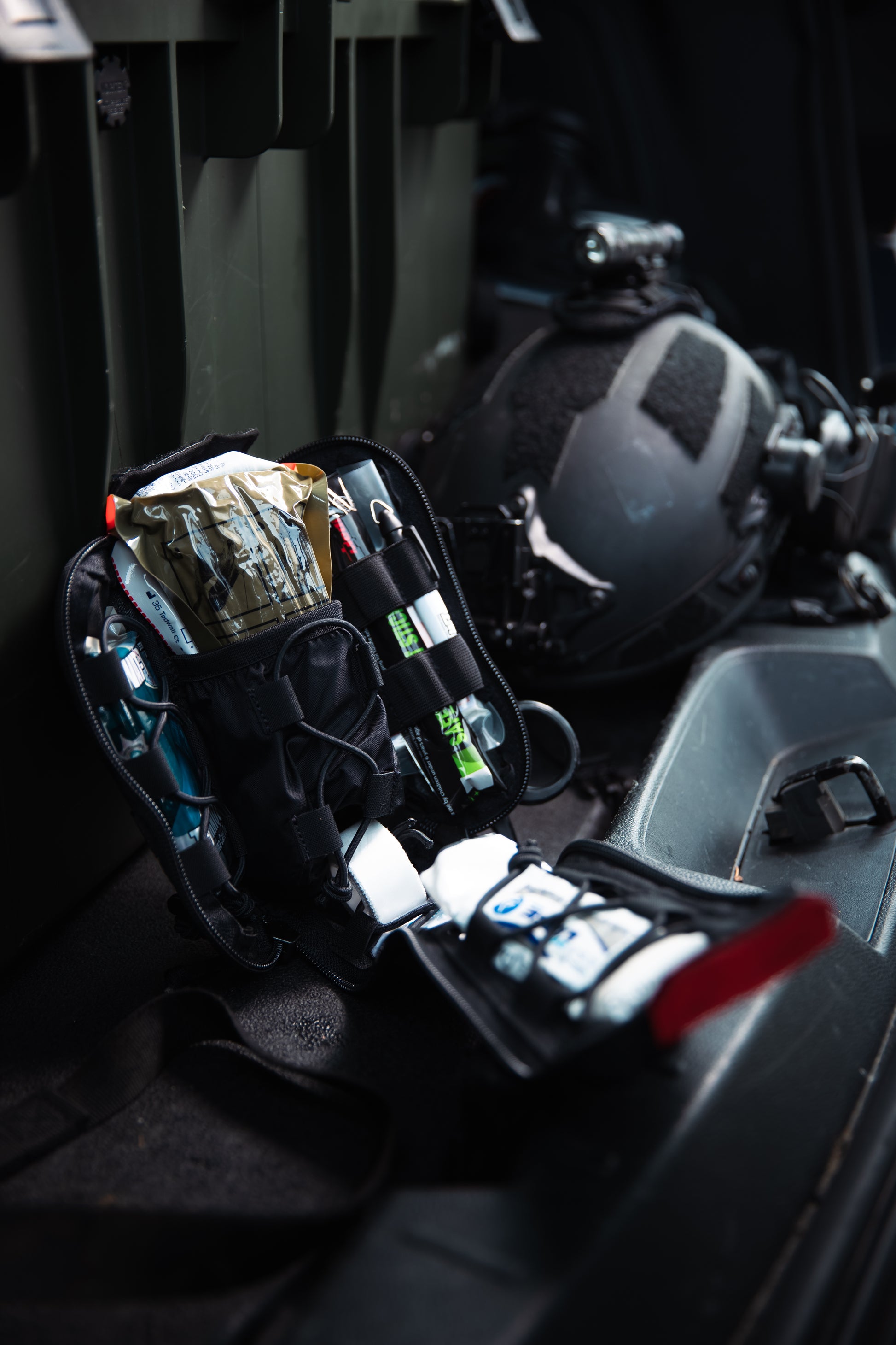 The RTS Tactical Black IFAK kit open and ready for use in high stress situations.