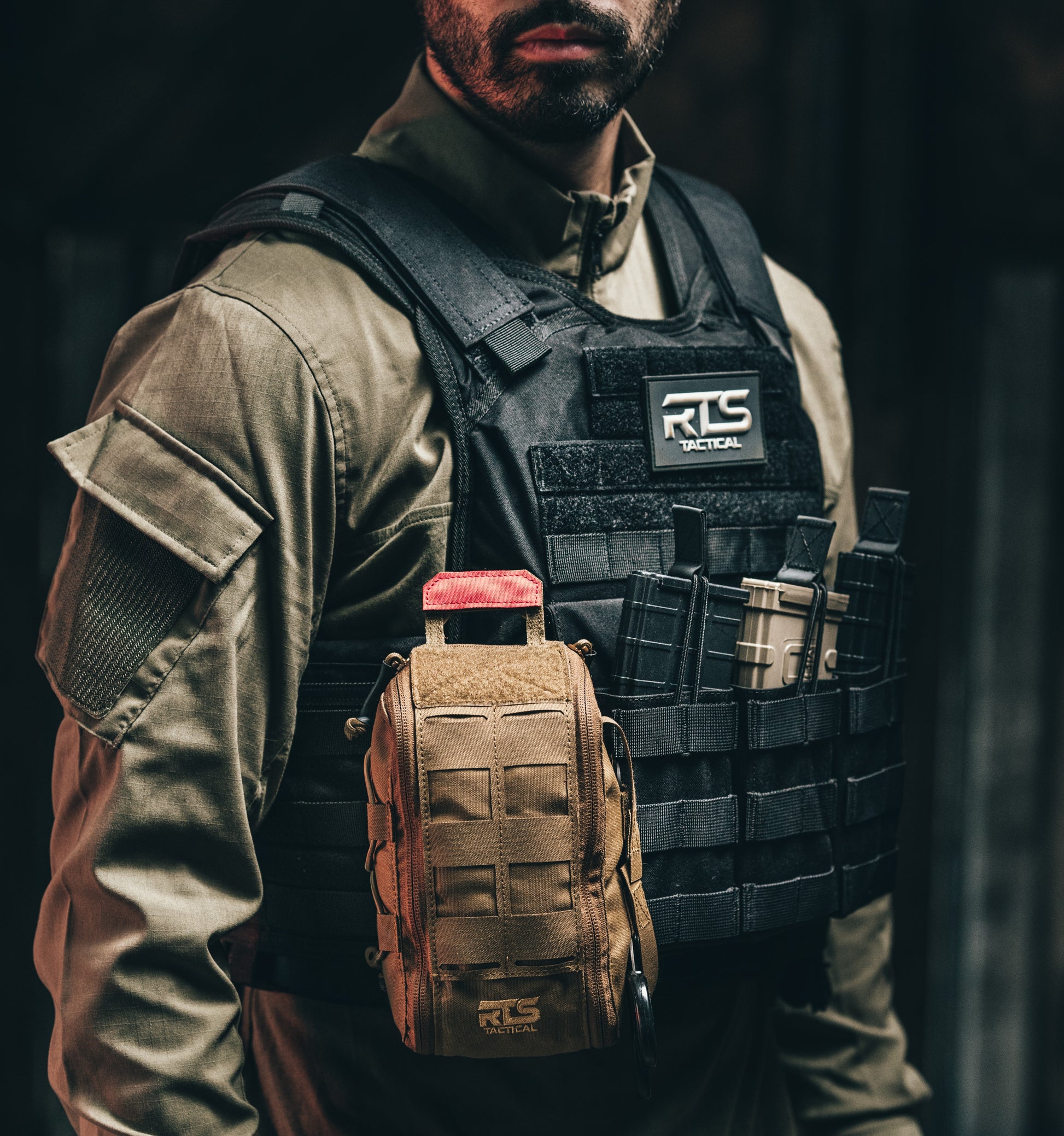 A plate carrier IFAK pouch secured on the front of an RTS Tactical plate carrier.