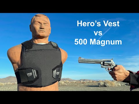 A shooting demonstration featuring a dummy wearing a Hero's Vest, with a person aiming a 500 Magnum revolver at it